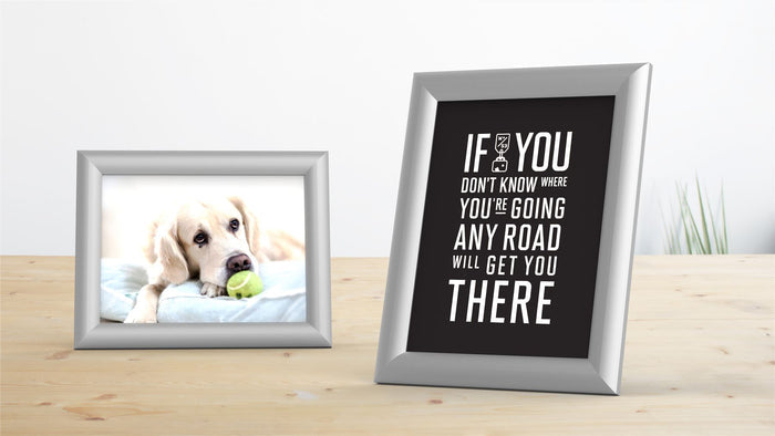 Silver picture and poster frame displaying a photo of a golden retriever and a motivational quote.