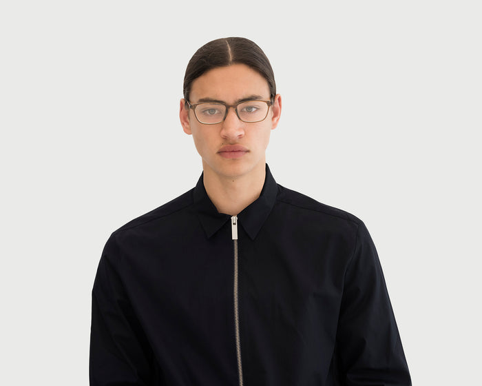 lifestyle-Amber-Brown::men Neal+ Eyeglasses rectangle brown plant-based