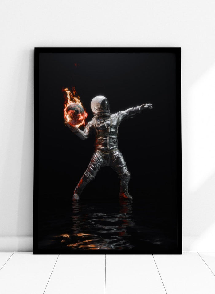 Person in a silver suit holding a flaming sphere against a black background. Astronaut Burning Earth by Nicebleed is a surreal astronaut art print featuring a flaming planet, dark background, and modern sci-fi aesthetic poster design.