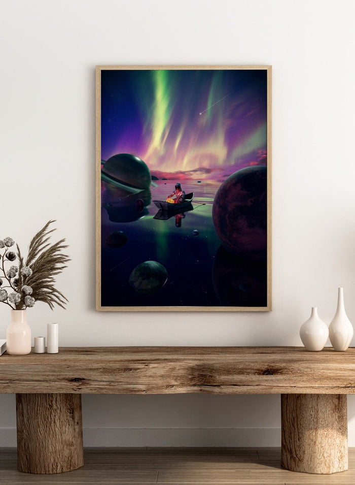 A futuristic scene with a person in a spacesuit on a planet, surrounded by colorful aurora lights and floating planets. Astronaut Drifts Under Aurora by Nicebleed is a surreal space art print featuring an astronaut in a boat under colorful aurora skies, modern aesthetic wall poster.