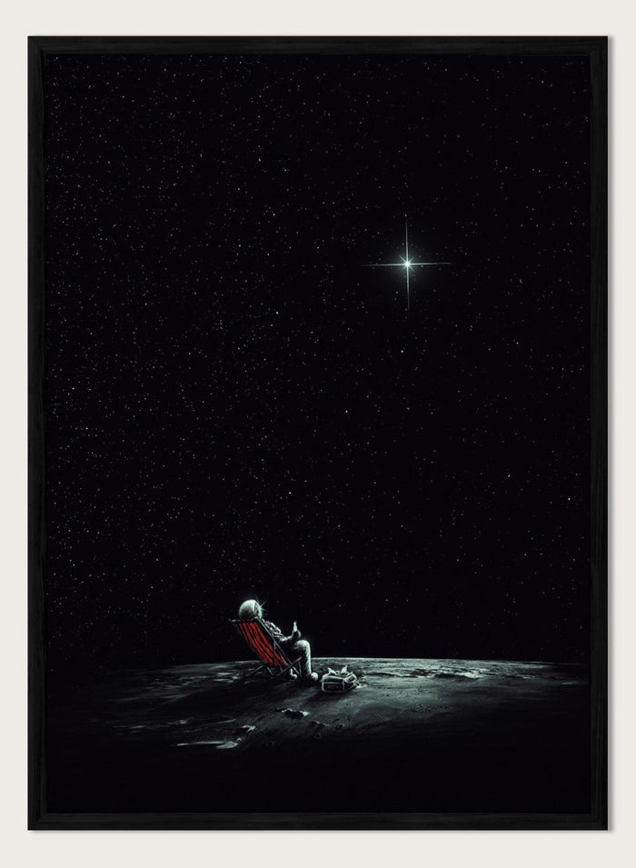Person sitting on a chair under a starry sky. Astronaut Star Gazer by Nicebleed is a surreal space art print featuring a lone astronaut under a star-filled sky, modern aesthetic wall poster.