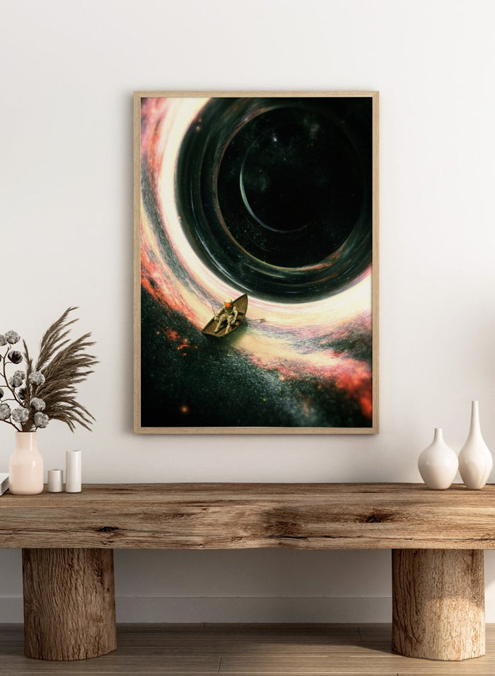 Artistic depiction of a spaceship approaching a black hole with colorful nebulae in the background. Astronaut’s Cosmic Journey by Nicebleed is a surreal space art print featuring an astronaut in a boat drifting into a black hole, modern aesthetic wall poster.