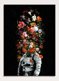 Artistic depiction of a person in astronaut suit with floral elements on a black background. Blooming Astronaut by Nicebleed is a surreal floral space art print featuring an astronaut with a head of flowers, modern aesthetic wall poster.