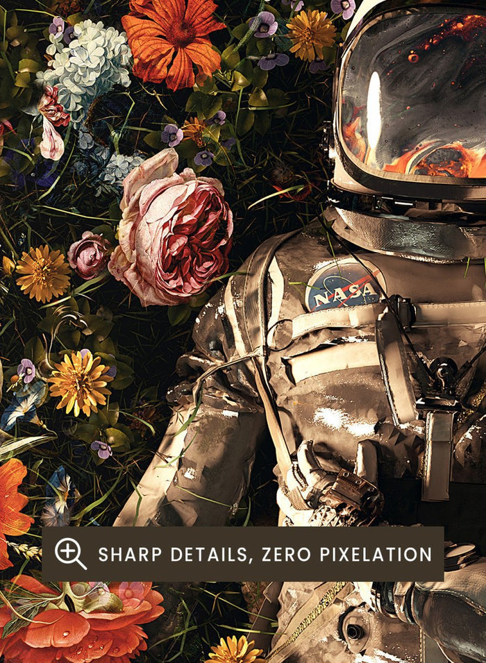 Astronaut lying on a bed of flowers with a dark background. Cosmic Couple Bloom by Nicebleed is a surreal astronaut floral art print featuring two astronauts in a field of flowers, modern aesthetic wall poster.