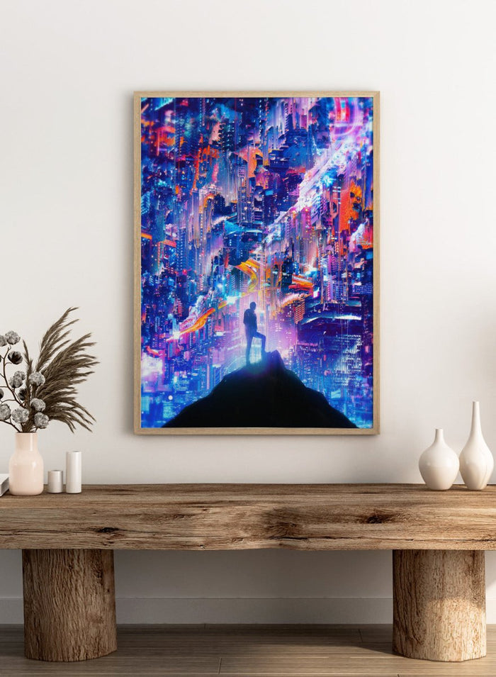 Person standing on a hill overlooking a futuristic cityscape with vibrant colors. Neon City Dreamer by Nicebleed is a surreal cyberpunk city art print featuring a lone figure in a neon glitch skyline, modern aesthetic wall poster.