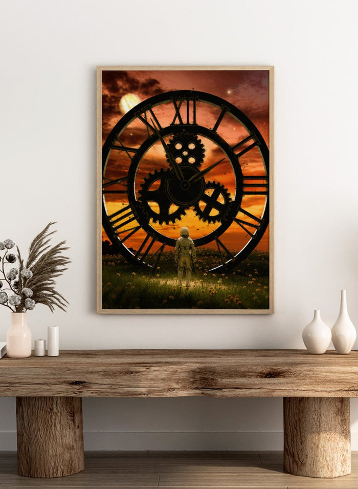 Time Traveler’s Sunset by Nicebleed is a surreal astronaut art print featuring a giant clock, sunset sky, and sci-fi landscape, modern aesthetic poster design.