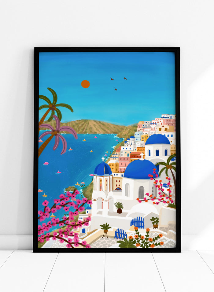 Shop Santorini Blue Domes by Nidhi Kachhadiya, a colorful Greek island wall art print inspired by Santorini, blue domes, whitewashed architecture, and Mediterranean views. A colorful illustrated coastal village scene with white buildings, bright blue domes, palm trees, pink flowering branches, a blue sea, and a clear sky with a sun and birds.