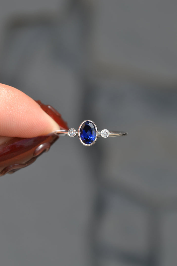 Oval Sapphire Diamond Accent Ring