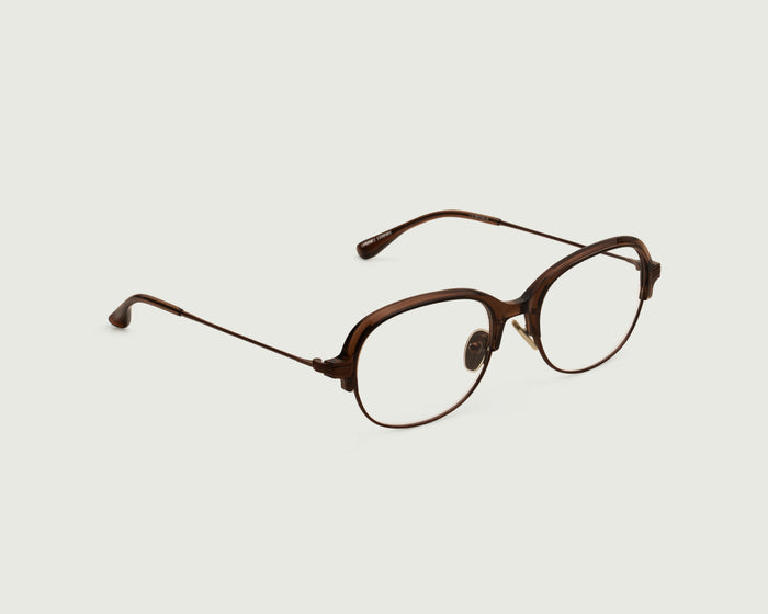 Whiskey ::Penelope Eyeglasses Round Brown castor seed front diagonal