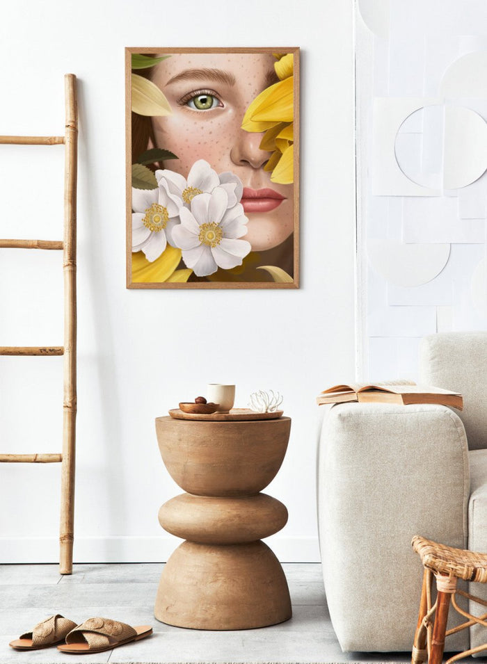Close-up of a woman's face with yellow flowers around her, featuring a green eye. In the Garden by Petra Holíková is a modern floral portrait art print poster with botanical detail and contemporary aesthetic wall art.