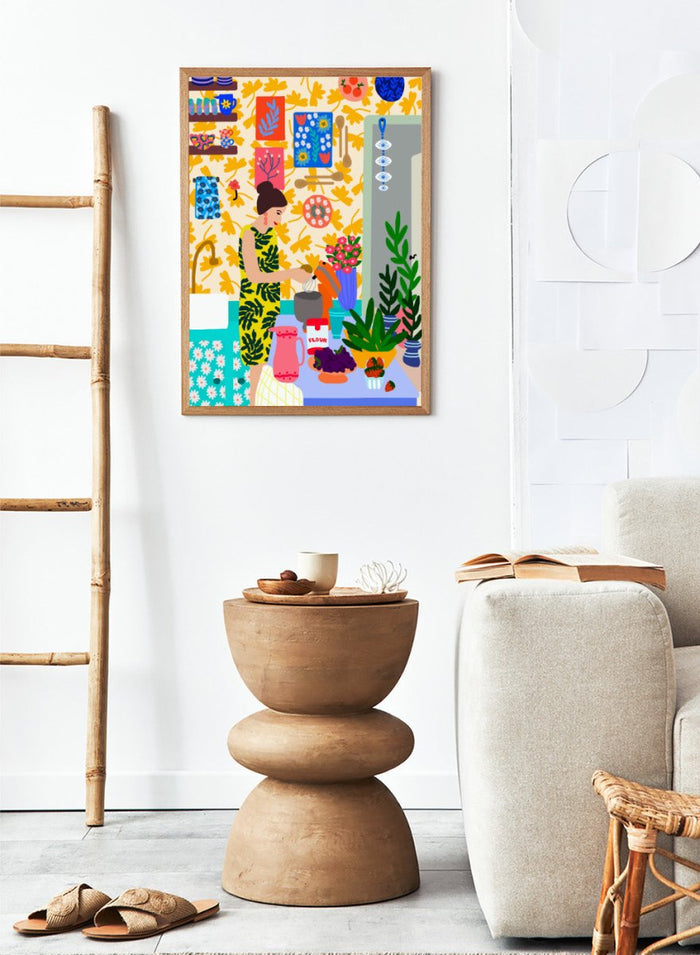 Colorful illustration of a woman cooking in a kitchen with various items and patterns. A Woman in a Kitchen with Flowers by Rafaela Mascaro fine art print poster featuring woman baking, floral wallpaper, fruit and flowers, modern contemporary kitchen wall art.