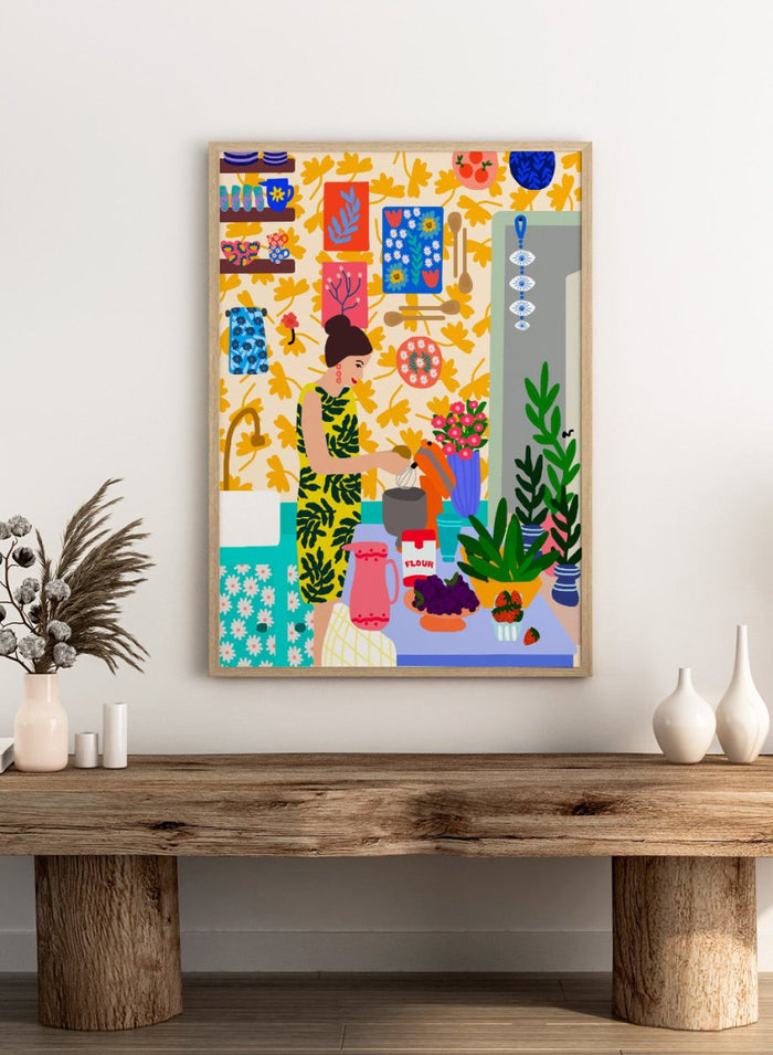 Colorful illustration of a woman cooking in a kitchen with various items and patterns. A Woman in a Kitchen with Flowers by Rafaela Mascaro fine art print poster featuring woman baking, floral wallpaper, fruit and flowers, modern contemporary kitchen wall art.