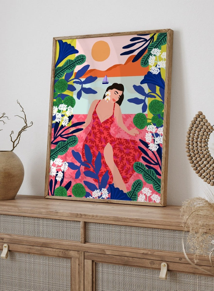 Woman in a red dress surrounded by tropical plants and flowers with a colorful sky. Floral Sunset Girl by Rafaela Mascaro is a vibrant tropical art print featuring bold florals, lush botanicals, coastal views, and colorful contemporary illustration.