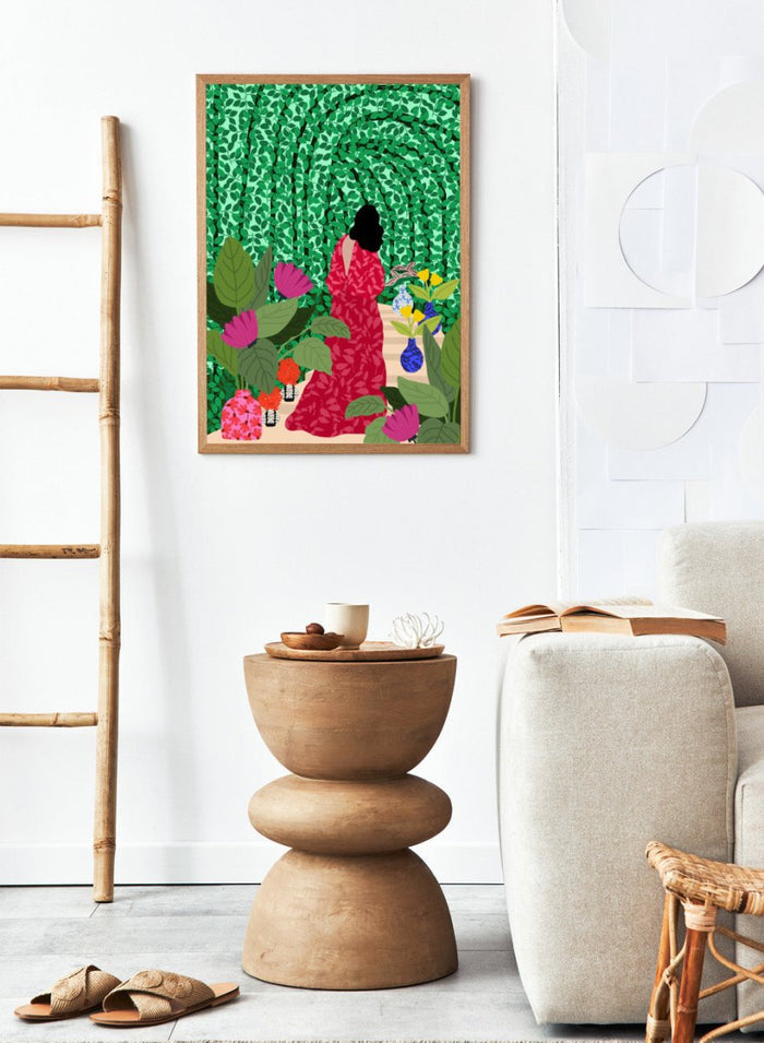 Girl at Her Garden by Rafaela Mascaro fine art print featuring lush green botanical background, red dress figure, and modern contemporary wall art poster.