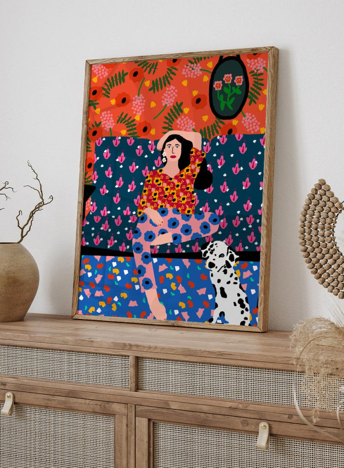 Colorful abstract art piece with a woman and dog on a patterned background. Girl in the Sofa by Rafaela Mascaro fine art print poster featuring lounging woman, Dalmatian dog, bold patterned couch, floral wallpaper, modern contemporary wall art.