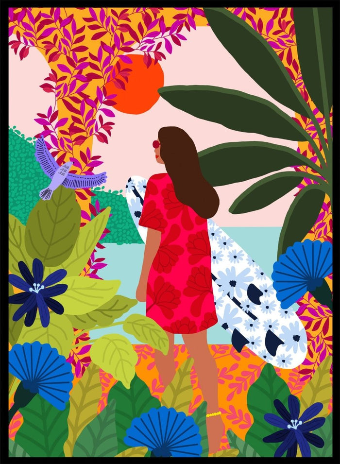 Woman in a red dress with a white surfboard amidst tropical foliage and flowers. Going Surfing by Rafaela Mascaro is a colorful tropical art print featuring a surfer, lush botanicals, vibrant florals, and sunny coastal inspiration.