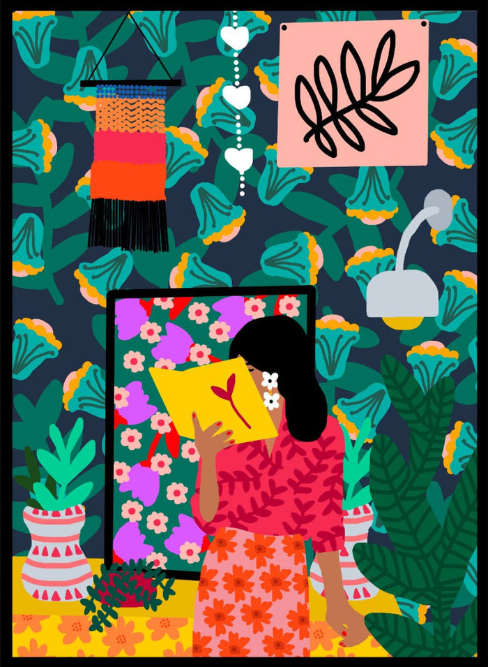 Colorful illustration of a woman reading a book with a vibrant patterned background. In Her Own Pages by Rafaela Mascaro fine art print featuring woman reading book, bold floral wallpaper, botanical interior, modern wall art poster.