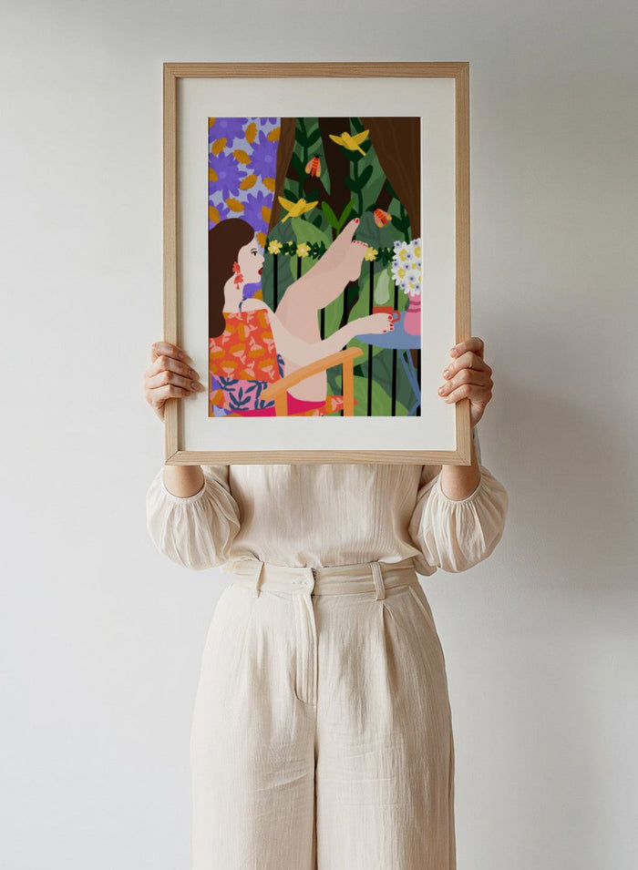 Illustration of a woman sitting by a pool with flowers and birds in a colorful garden setting. Morning on the Balcony by Rafaela Mascaro fine art print poster featuring woman with coffee, birds, lush greenery, botanical scene, modern contemporary wall art.