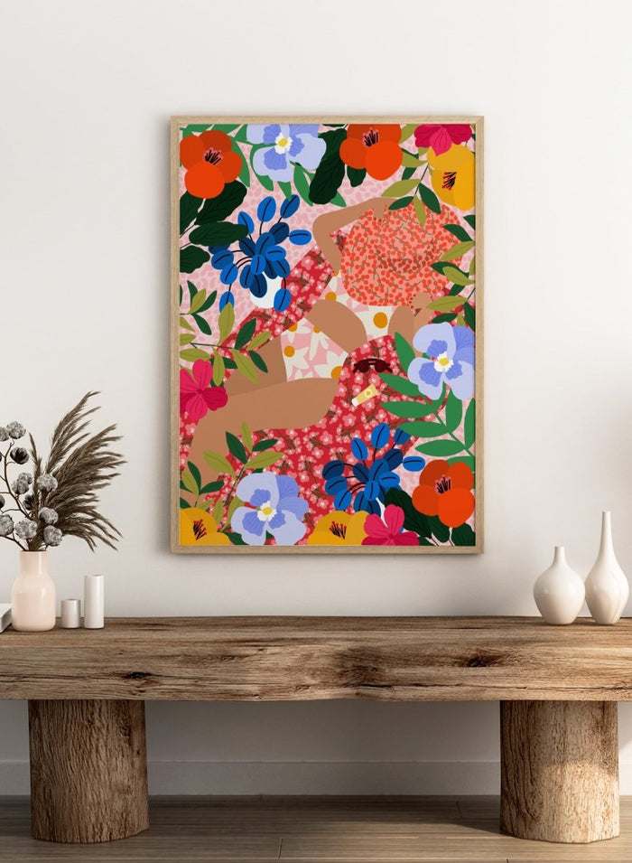 Colorful floral pattern with abstract shapes on a pink background. Sleeping Under the Sun by Rafaela Mascaro is a vibrant floral art print filled with bold colors, botanical details, decorative patterns, and summer warmth.