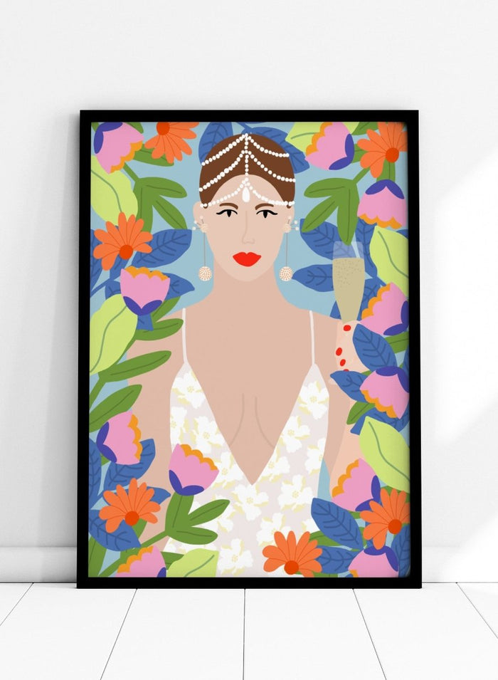 Illustration of a woman with flowers and leaves around her. Summer Queen in Flowers by Rafaela Mascaro is a vibrant floral art print celebrating confidence, femininity, color, and lush botanical beauty.