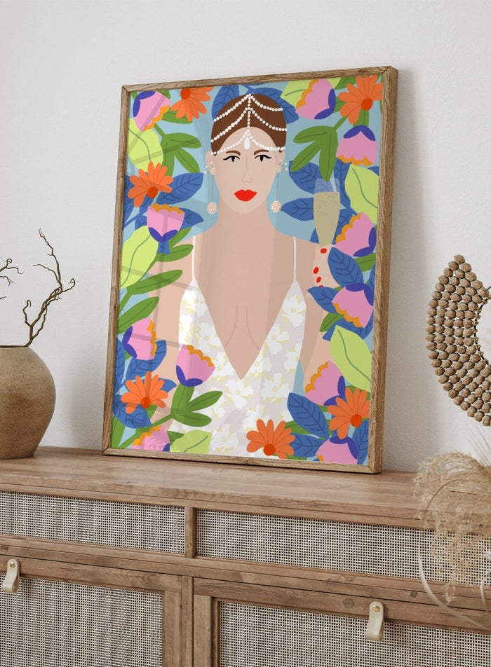 Illustration of a woman with flowers and leaves around her. Summer Queen in Flowers by Rafaela Mascaro is a vibrant floral art print celebrating confidence, femininity, color, and lush botanical beauty.