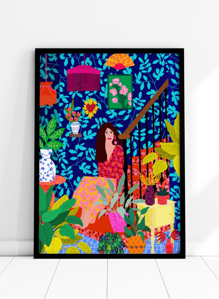 Colorful illustration of a woman sitting among plants and decorative items on a blue background. The Botanical Staircase by Rafaela Mascaro fine art print featuring blue botanical wallpaper, patterned staircase interior, modern contemporary wall art poster.