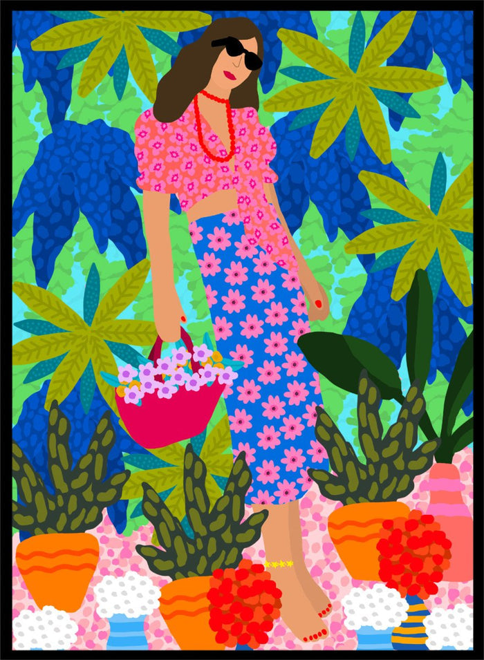 Woman in a floral dress holding a basket of flowers amidst colorful plants. Walking Between Gardens by Rafaela Mascaro fine art print poster featuring woman carrying flowers in lush tropical garden, modern contemporary botanical wall art.