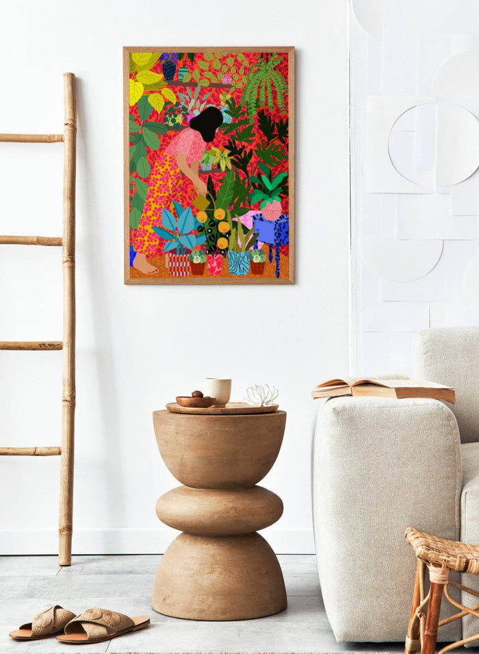 Colorful illustration of a person tending to plants with a vibrant background. Watering My Plants by Rafaela Mascaro fine art print featuring bold botanical interior, modern woman illustration, and colorful contemporary wall art poster.