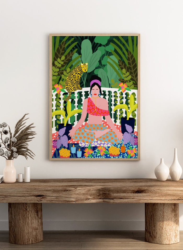 Illustration of a woman in a colorful dress sitting in a garden with plants and flowers. Woman in Lotus Position by Rafaela Mascaro art print featuring meditation figure, tropical plants, leopard balcony scene, and vibrant contemporary botanical wall art poster.