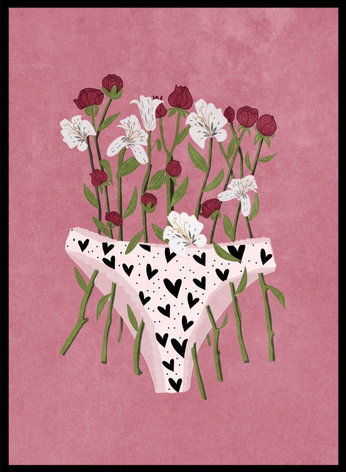 White underwear with black heart patterns surrounded by flowers on a pink background. Blooming Slip by Raissa Oltmanns features a feminist illustration of flowers growing from heart-patterned underwear on a pink background. Bold floral art print with strong feminine symbolism.