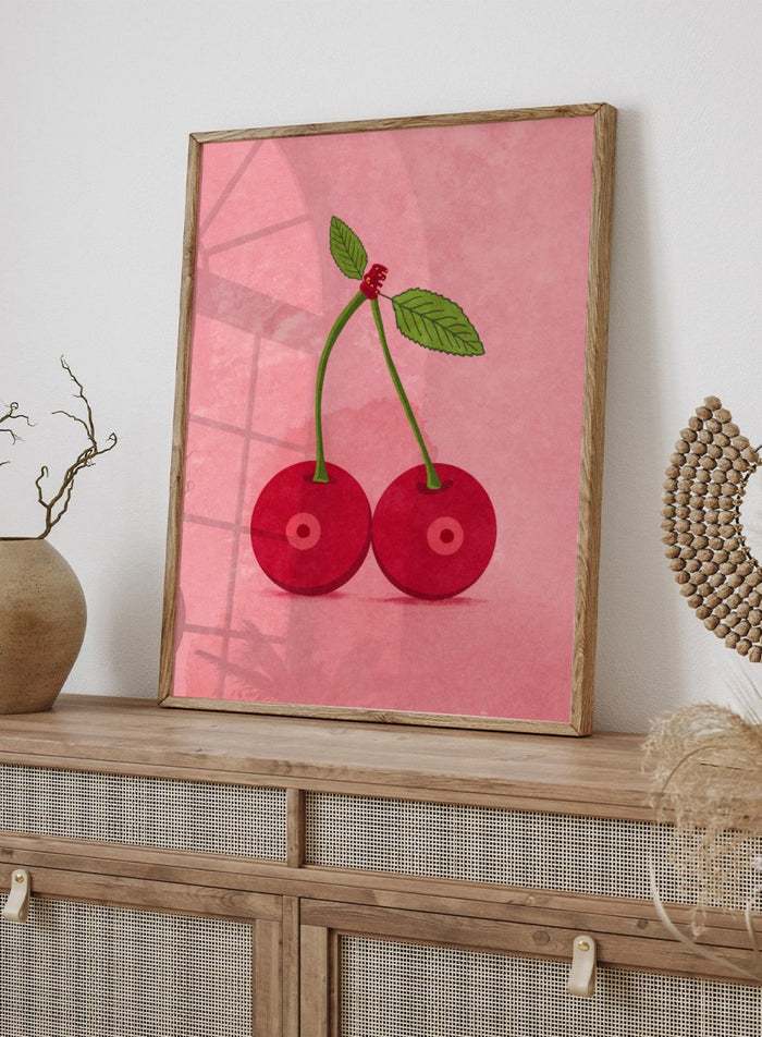 Illustration of two cherries on a pink background. Cherry Boobs by Raissa Oltmanns is a modern pop art fine art print featuring red cherries illustration and bold playful contemporary wall decor poster.