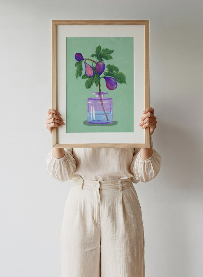 Illustration of a plant with purple fruits in a glass bottle on a green background. Figs Branch In Vase by Raissa Oltmanns is a modern fig still life art print with purple fruit and botanical kitchen wall poster design.