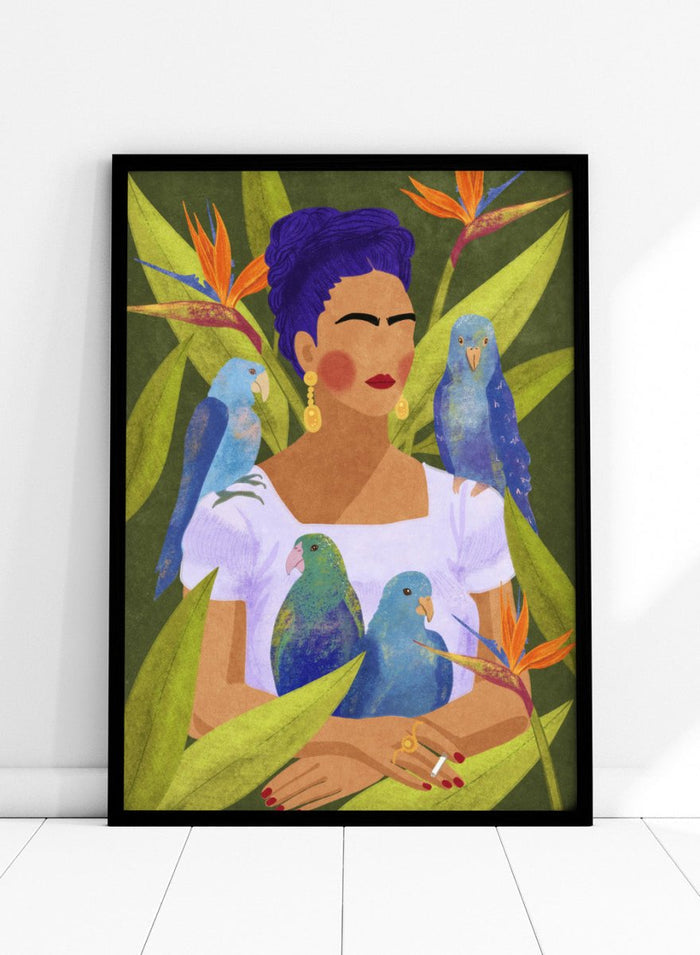 Artistic depiction of a woman with blue hair surrounded by parrots and tropical plants. Frida and Birds by Raissa Oltmanns is a modern Frida Kahlo inspired art print with tropical birds and bold botanical wall poster design.