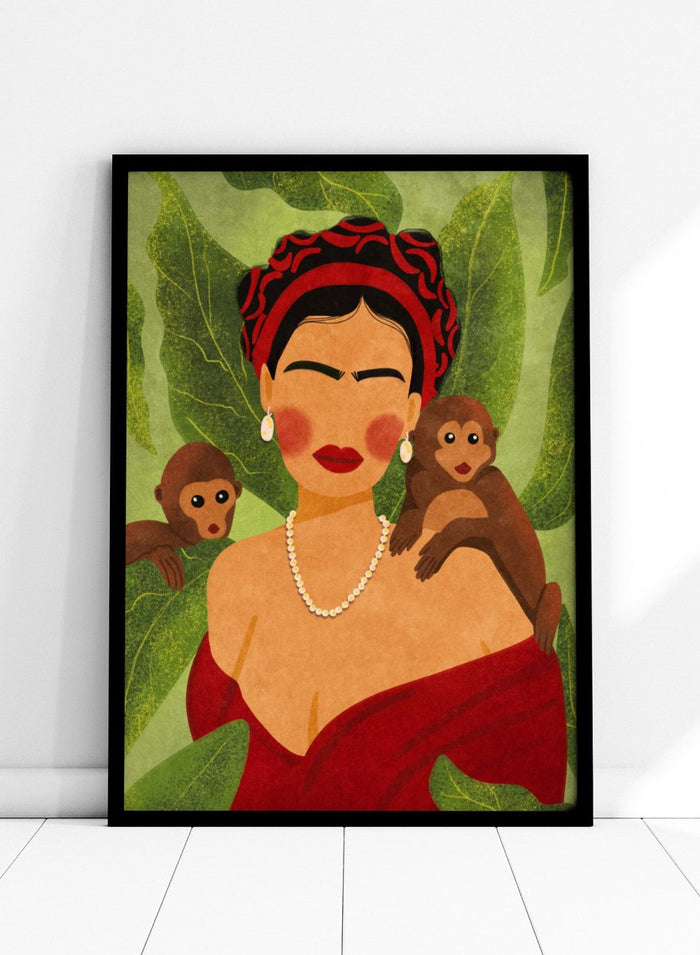 Illustration of a woman with two monkeys on a green leafy background. Frida and Monkeys by Raissa Oltmanns fine art print featuring modern Frida Kahlo portrait with monkeys, bold contemporary wall decor poster.