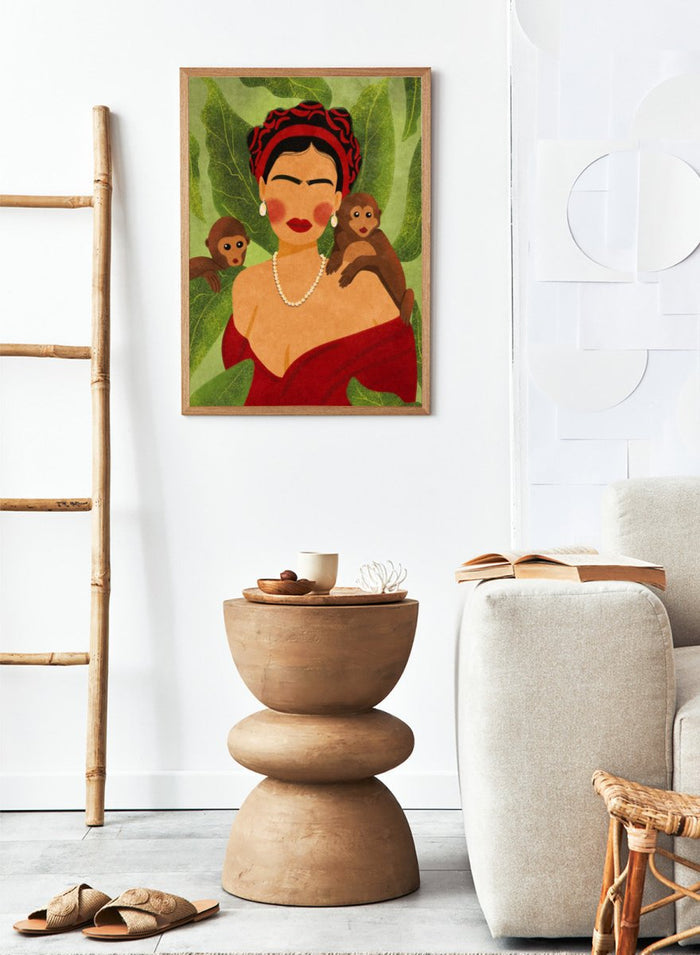 Illustration of a woman with two monkeys on a green leafy background. Frida and Monkeys by Raissa Oltmanns fine art print featuring modern Frida Kahlo portrait with monkeys, bold contemporary wall decor poster.