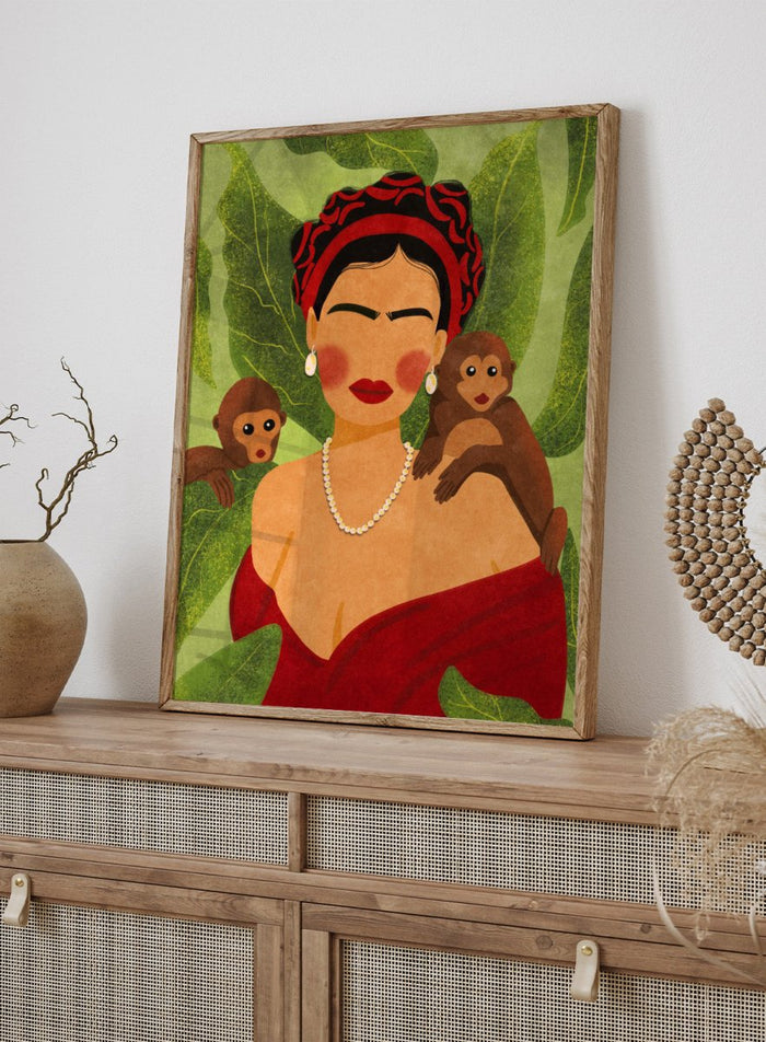 Illustration of a woman with two monkeys on a green leafy background. Frida and Monkeys by Raissa Oltmanns fine art print featuring modern Frida Kahlo portrait with monkeys, bold contemporary wall decor poster.