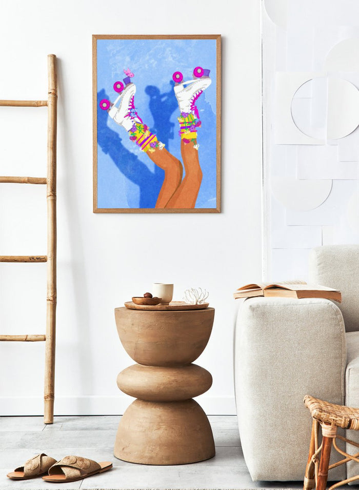 Colorful roller skates with pink and purple wheels on a blue background. Skate Like a Girl by Raissa Oltmanns fine art print featuring colorful roller skate illustration, bold feminine wall decor, modern contemporary poster design.