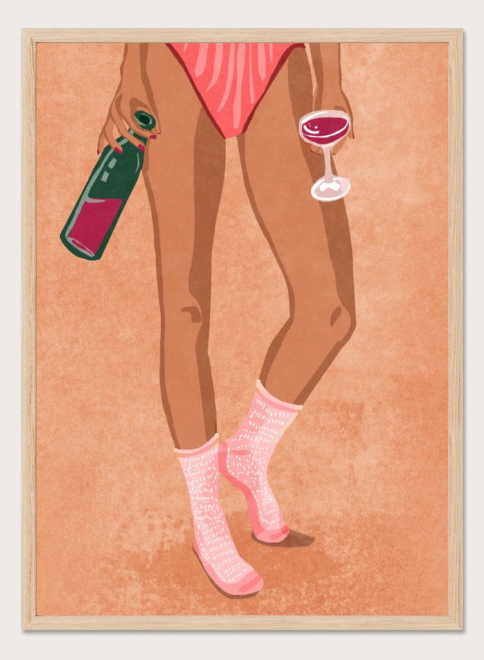 Illustration of a person's legs wearing pink socks with text, holding a bottle and a glass on a peach background. Wine and Socks by Raissa Oltmanns is a modern woman art print featuring wine bottle and glass in bold contemporary wall poster style.