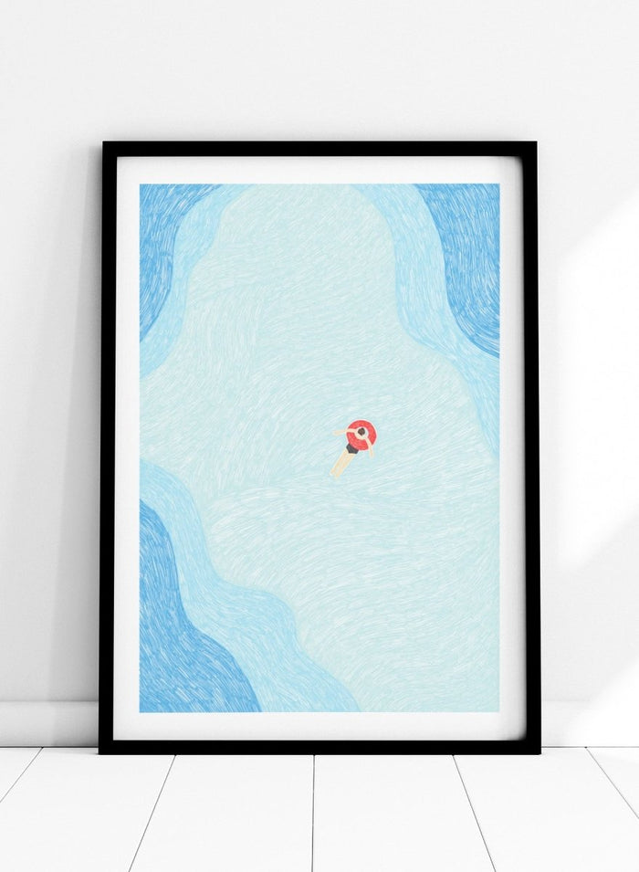 Calm Summer Swim by Rio Soléy is a minimalist coastal art print featuring a lone swimmer, soft blue water, playful illustration, and relaxed summer vibes.