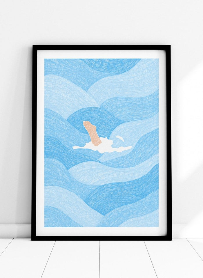 Illustration of a person swimming in blue water with a white border. Hand Reaching Blue Ocean by Rio Soléy is a modern coastal art print featuring swirling blue waves, minimalist illustration, playful design, and contemporary seaside charm.