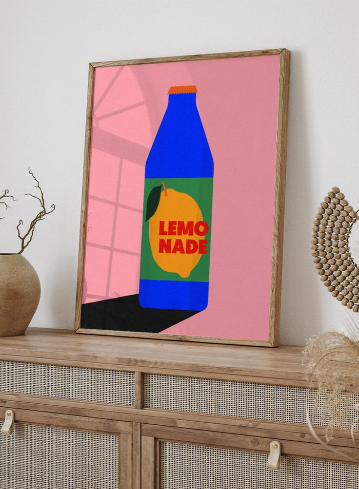 Blue bottle labeled 'Lemonade' with a lemon graphic on a pink background. Lemonade by Rosi Feist is a contemporary food and drink art print, perfect as modern kitchen poster wall decor with bold graphic design.