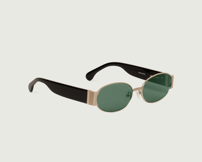 White Gold Pond::Moya Sunglasses oval Gold metal front diagonal