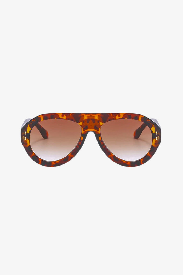 Tortoiseshell sunglasses with a white background
