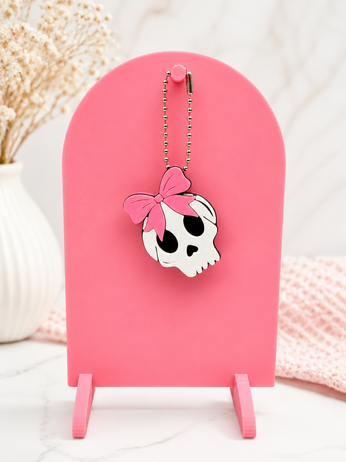 skull with bow can tab opener