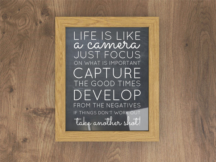 Framed inspirational quote artwork in a sleek oak picture and poster frame.