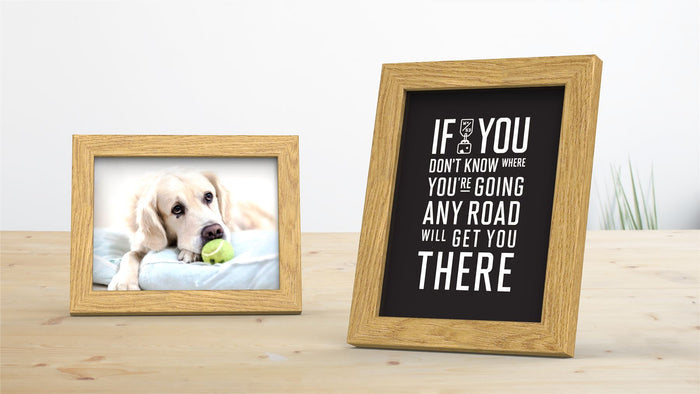 Sleek range oak picture and poster frames displaying a dog photo and motivational quote.