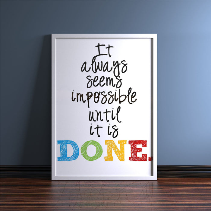 Sleek white picture frame displaying a motivational quote about perseverance and completing tasks.