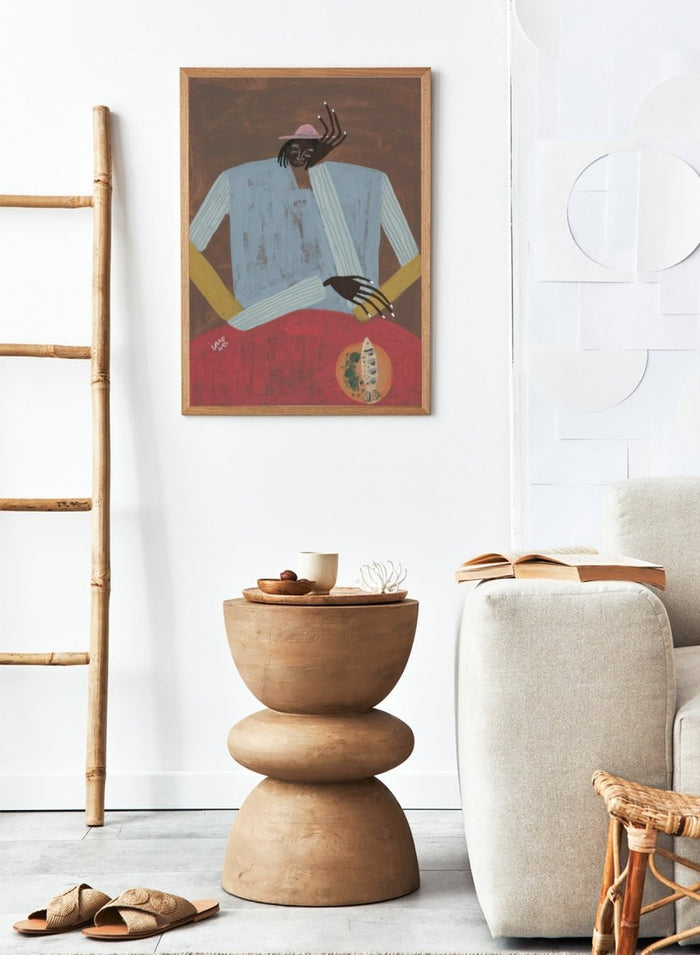 Artistic depiction of a person wearing a hat and sweater with a red background. Clear My Head by Studio IMO (Ibi Meier-Oruitemeka) is a modern figurative art print with a seated figure and contemporary portrait wall poster design.