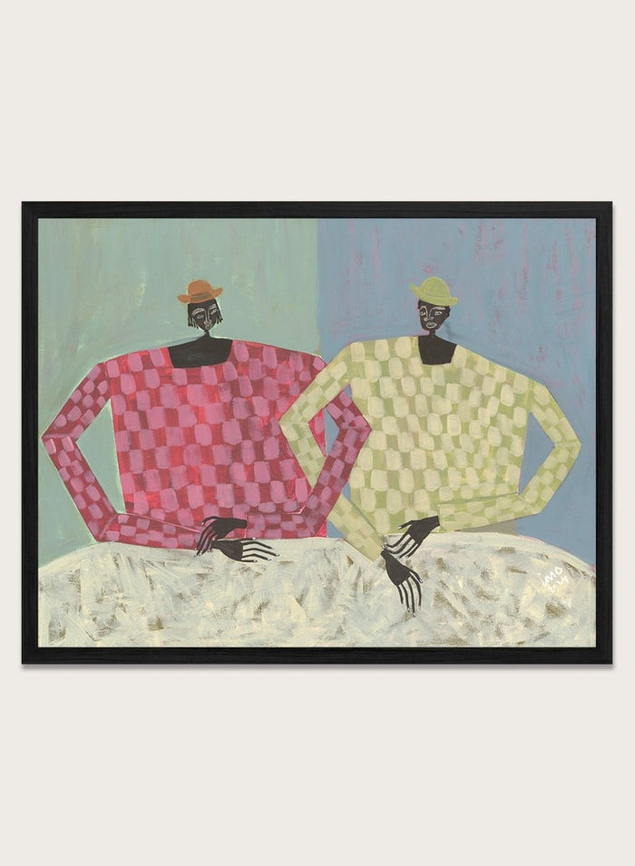 Framed artwork of two figures wearing colorful sweaters against a textured background. Opposites by Studio IMO (Ibi Meier-Oruitemeka) is a modern figurative art print with two figures, bold color contrast, and contemporary wall poster design.