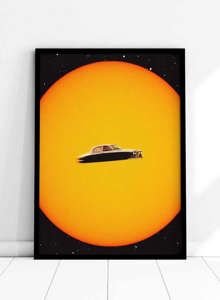 UFO-like vintage car on a yellow background. Space Chase by Taudalpoi surreal retro car in space art print with giant sun and vintage vehicle, cosmic collage sci fi poster wall art.